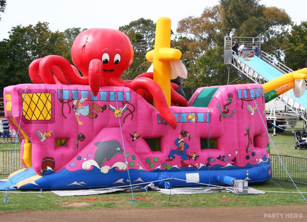 Captain Cook's Endeavour pirate ship inflatable at an outdoor fair